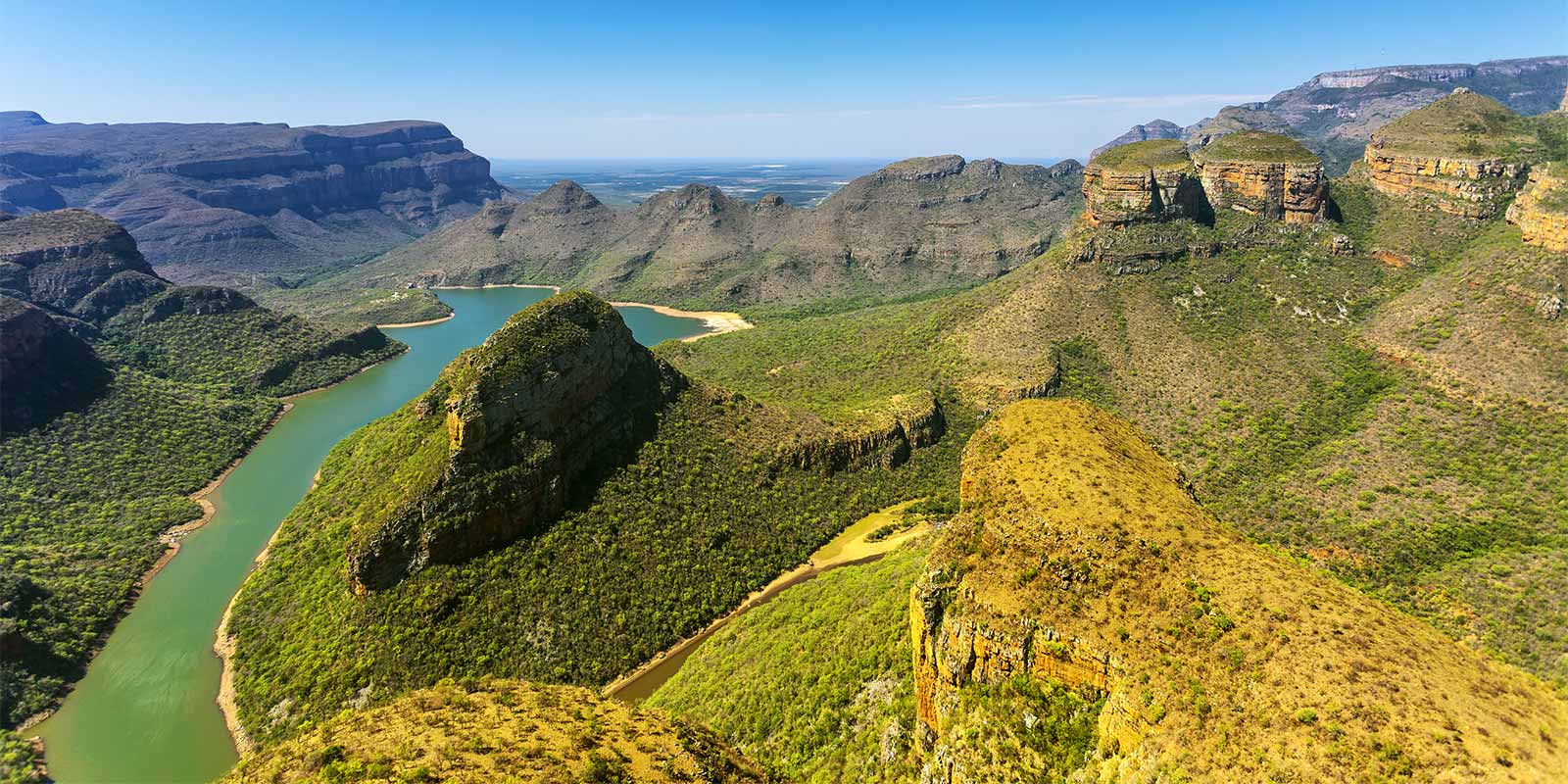 Aerial view of Blyde River canyon with three dolomite peaks