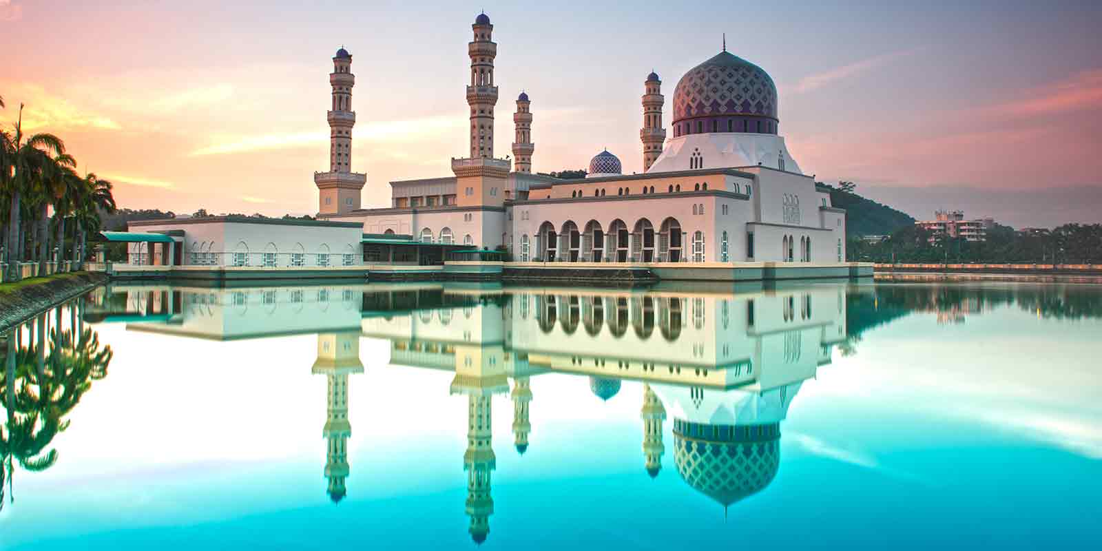 Reflection of Kota Kinabalu mosque at sunrise