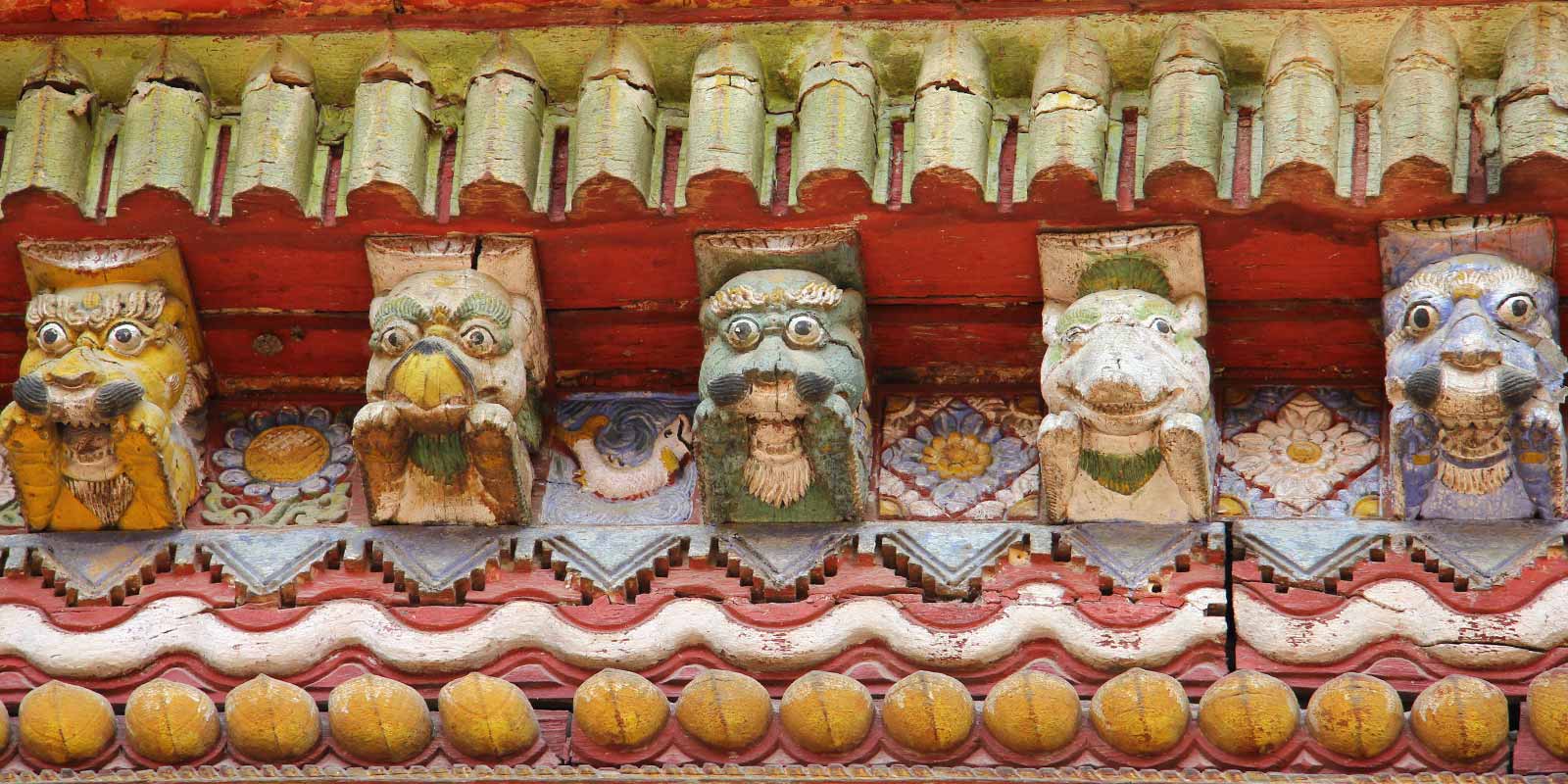 Carved faces of Changu Narayan Temple in Bhaktapur
