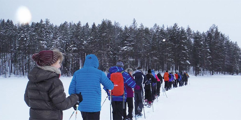 School group cross-country skiing in Finland