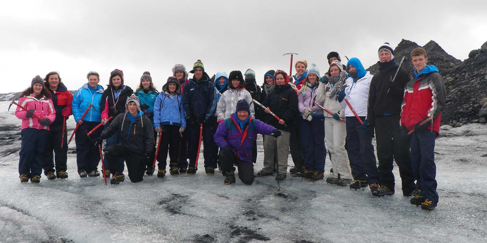 School group with ice picks after glacier trekking