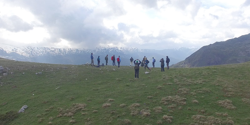 Group of people hiking on mountain in Mavrovo National Park Macedonia