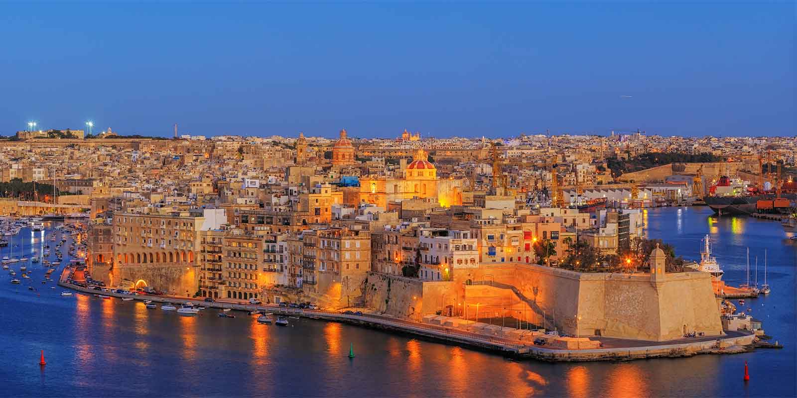 The harbour of Malta's capital city of Valetta at night
