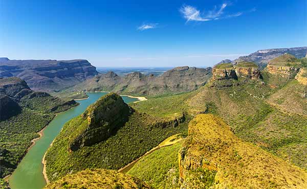 Aerial view of Blyde River canyon with three dolomite peaks