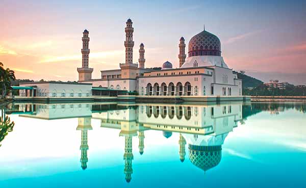 Reflection of Kota Kinabalu mosque at sunrise