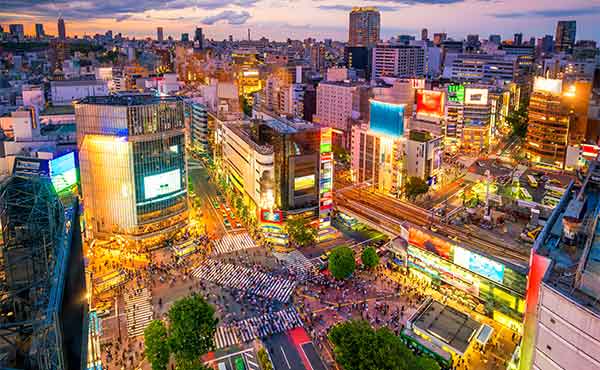 Aerial view at night of Shibuya Crossing in Tokyo