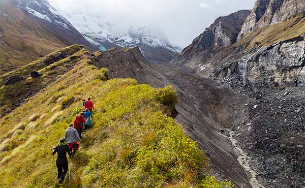 Group trekking on Himalayan mountain ridge
